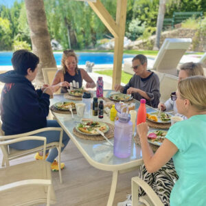 Around the table Where strangers become friends and friendships become lifelong support